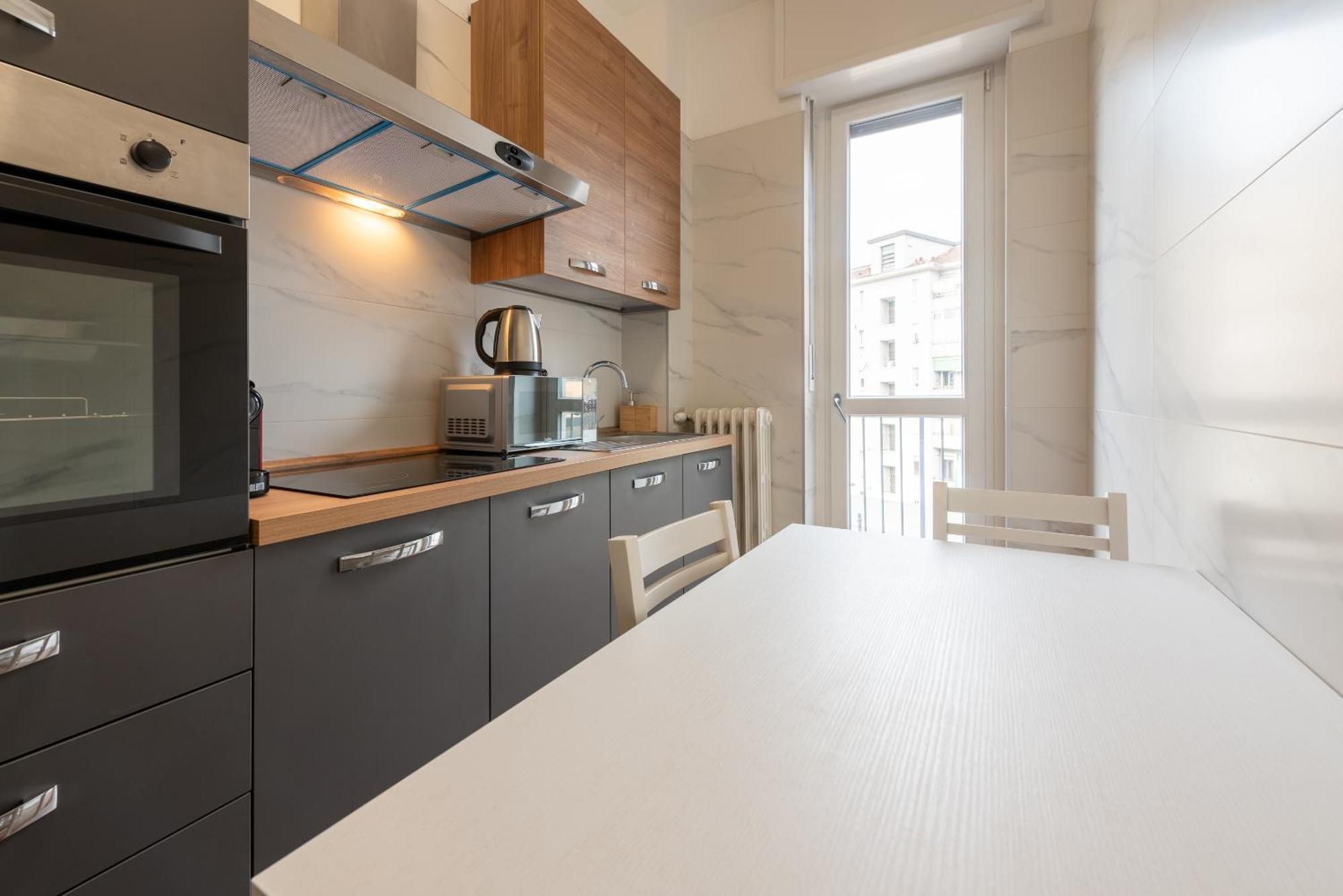 Guest Planet - Bicocca Suites Milano Bagian luar foto